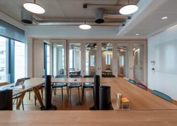 Divisible meeting room at Consensys office fit out large office meeting room with glass and timber room divider