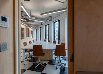 Triangular meeting room at Consensys triangular meeting room with triangular table
