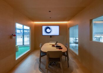 Meeting room at Consensys office fit out timber clad office meeting room at consensys