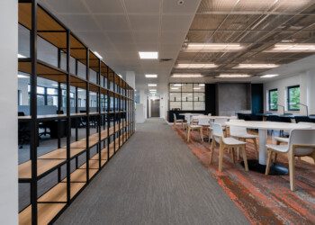 Open plan office interior at Integration House industrial style open plan office interior