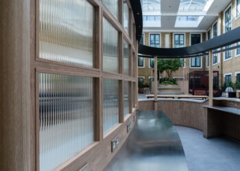 Interior glazing and bespoke joinery at One Arlington Square Interior glazing in office atrium