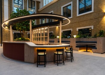 Illuminated bar area in atrium illuminated bar area in atrium at one arlington square