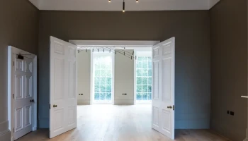 Refurbished reception room at 21 Bedford Square with modern chandelier Refurbished room at 21 Bedford Square with modern chandelier