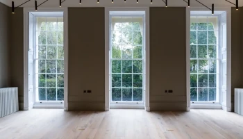 Refurbished reception room at 21 Bedford Square with modern chandelier refurbished georgian townhouse with modern black chandelier
