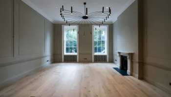 Refurbished reception room at 21 Bedford Square with modern chandelier refurbished georgian townhouse interior with modern chandelier