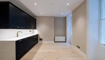 Office kitchen space at 21 Bedford Square Black office kitchen